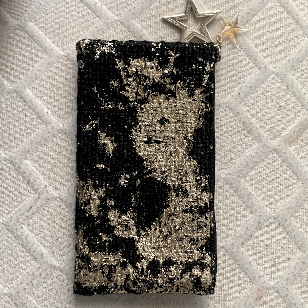 Small cute black and gold Mac cosmetics bag